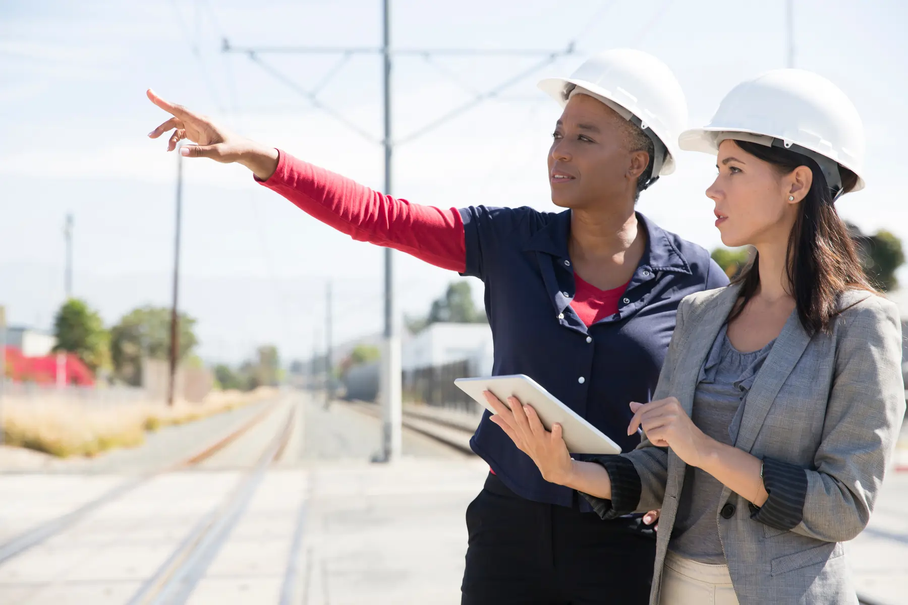 Two city workers doing a digital audit using software